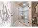 Attractive bathroom showcasing a glass shower, and stone flooring at 663 Turnberry Ct, Tarpon Springs, FL 34688