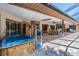 Screened-in pool with spa, sauna, and outdoor patio area at 663 Turnberry Ct, Tarpon Springs, FL 34688
