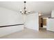 Bright dining room featuring vintage chandelier and access to kitchen at 7012 Ponderosa Dr, Tampa, FL 33637