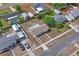 A bird's-eye view of the home showcasing its proximity to neighborhood amenities and other houses at 7050 Merrick Ln, Spring Hill, FL 34606