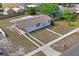 Charming single-story home with a covered carport and neat landscaping at 7050 Merrick Ln, Spring Hill, FL 34606