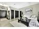 Neutral living room with a white sofa, black coffee table and black accents at 7233 Royal Oak Dr, Spring Hill, FL 34607