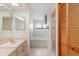 Bathroom view featuring a tub, shower, and vanity with ample space and updated fixtures at 7270 Nightwalker Rd, Weeki Wachee, FL 34613