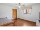 Bedroom with a hardwood floor and natural lighting at 7270 Nightwalker Rd, Weeki Wachee, FL 34613