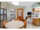 Inviting breakfast nook provides an open flow to the main living areas of the home at 7270 Nightwalker Rd, Weeki Wachee, FL 34613