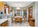 Breakfast nook area filled with natural light and views of the outdoors at 7270 Nightwalker Rd, Weeki Wachee, FL 34613