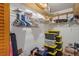 Walk-in closet with wire shelving and storage containers for organization at 7270 Nightwalker Rd, Weeki Wachee, FL 34613