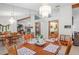 Elegant dining space with traditional furniture and modern chandelier at 7270 Nightwalker Rd, Weeki Wachee, FL 34613