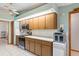 Well-equipped kitchen boasts modern appliances, ample counter space, and cabinetry for storage at 7270 Nightwalker Rd, Weeki Wachee, FL 34613