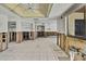 Renovation-ready living room with tile flooring and space for a custom kitchen at 7300 Southwind Dr, Hudson, FL 34667