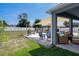 Backyard with inground pool, outdoor seating, pergola, and stylish patio at 733 Old Windsor Way, Spring Hill, FL 34609