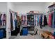Spacious walk-in closet with ample storage, including shelving, hanging rods, and plenty of room for organization at 733 Old Windsor Way, Spring Hill, FL 34609