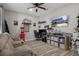 Comfortable Living Room featuring wood-look floors, fan, and sofa at 733 Old Windsor Way, Spring Hill, FL 34609