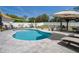 Beautiful backyard pool and entertainment area, perfect for relaxation and recreation at 733 Old Windsor Way, Spring Hill, FL 34609