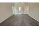 Comfortable bedroom offers natural light and easy access to the bathroom and other parts of the home at 7538 Landmark Dr, Spring Hill, FL 34606