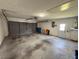 Spacious two-car garage with extra storage space, and garage door opener at 7538 Landmark Dr, Spring Hill, FL 34606
