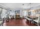 Open-concept dining area with views and wood floors for stylish gatherings at 779 Nodding Shade Dr, Brooksville, FL 34604