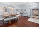 Inviting dining room features wood floors, bench seating and neutral decor at 779 Nodding Shade Dr, Brooksville, FL 34604