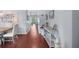 Open concept hallway with wood floors, natural light and neutral paint at 779 Nodding Shade Dr, Brooksville, FL 34604