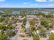 Aerial view of neighborhood with a community lake at 800 N Walton Ave, Tarpon Springs, FL 34689