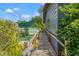 Exterior wooden ramp leading to the backyard area of the house at 800 N Walton Ave, Tarpon Springs, FL 34689