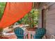 Cozy backyard patio with seating and landscaping at 800 N Walton Ave, Tarpon Springs, FL 34689