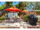 Backyard featuring a patio, outdoor dining, and grill at 800 N Walton Ave, Tarpon Springs, FL 34689