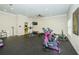 Fitness center with cardio machines and strength training equipment for a complete workout at 8210 Aquila St # 218, Port Richey, FL 34668