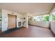 Clean and inviting hallway featuring an elevator and access to stairs, with a view of foliage outside at 8210 Aquila St # 218, Port Richey, FL 34668