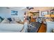 Spacious living room with coastal decor, open layout, and comfortable seating, ideal for entertaining and relaxation at 8210 Aquila St # 218, Port Richey, FL 34668