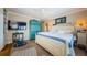 This main bedroom includes stylish decor, a sitting chair, and modern amenities for your comfort at 8210 Aquila St # 218, Port Richey, FL 34668