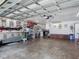 Spacious garage featuring ample storage and work space at 8600 N Briar Patch Dr, Port Richey, FL 34668