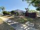 Lovely pool view of a fenced in backyard with a screened in patio at 8600 N Briar Patch Dr, Port Richey, FL 34668