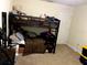 A disheveled room has a bunk bed, carpet, and a single door at 9007 49Th E Ave, Palmetto, FL 34221