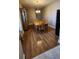 Cozy dining area showcases a wooden table with six chairs and classic wooden floors at 9007 49Th E Ave, Palmetto, FL 34221