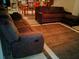Spacious living room with two sofas, carpet, and a large area rug at 9007 49Th E Ave, Palmetto, FL 34221