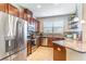 Well-equipped kitchen with stainless steel appliances, ample cabinet space, and a functional layout at 9103 Carolina Wren Dr, Tampa, FL 33626