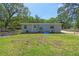Expansive backyard offering a large grassy area at 9226 Dan Lynn St, Brooksville, FL 34601