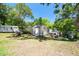 The backyard has storage sheds and chicken coop at 9226 Dan Lynn St, Brooksville, FL 34601