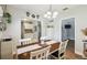 A cozy dining room offering seamless access to the kitchen and lovely natural light at 9226 Dan Lynn St, Brooksville, FL 34601