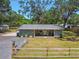 Charming single-story home with a well-manicured lawn and inviting front porch at 9226 Dan Lynn St, Brooksville, FL 34601
