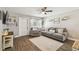 Comfortable living room with a plush gray sofa and neutral decor at 9226 Dan Lynn St, Brooksville, FL 34601