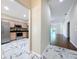 Hallway with views of the kitchen and the living room at 1006 Sweet Jasmine Dr, Trinity, FL 34655