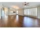 Spacious living room with hardwood floors and bright natural light at 1006 Sweet Jasmine Dr, Trinity, FL 34655