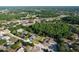 Aerial view of a residential neighborhood featuring homes with private pools at 10228 Beechcraft St, New Port Richey, FL 34654