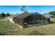 Aerial view of the property's pool and screen enclosure, providing privacy and a perfect outdoor living space at 10228 Beechcraft St, New Port Richey, FL 34654