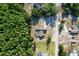 Aerial view of a peaceful residential area with homes featuring backyard pools at 10228 Beechcraft St, New Port Richey, FL 34654