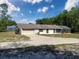 Charming single-story home with attached two-car garage and screened-in patio at 10228 Beechcraft St, New Port Richey, FL 34654