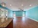 Living room with hard wood floors and view to the back yard at 10228 Beechcraft St, New Port Richey, FL 34654
