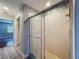 Bathroom showcasing a glass-enclosed shower stall with tiled walls and a chrome fixture, providing a clean and modern aesthetic at 10228 Beechcraft St, New Port Richey, FL 34654